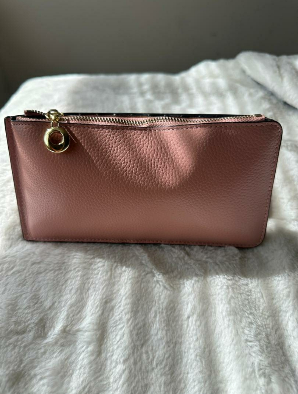 Women Pink Clutch Bag Featuring a Textured Leather Design and Gold-tone Hardware